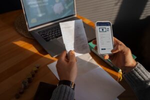 Man trying to transfer money from phone